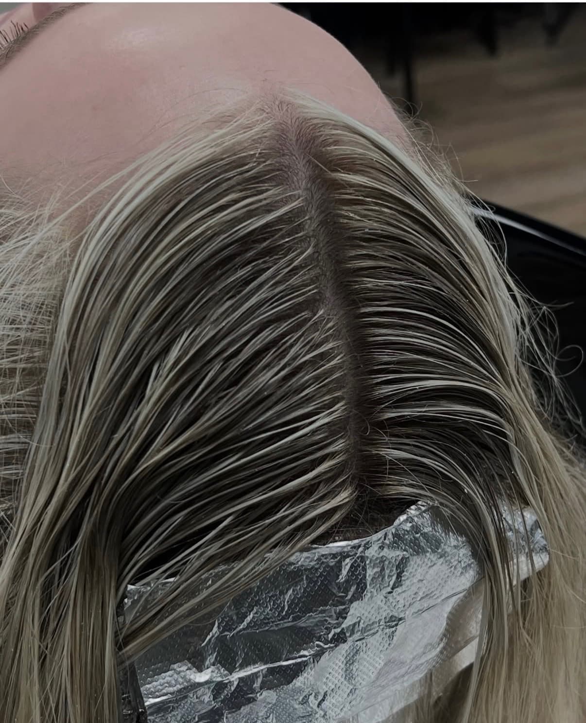 Blonde foil highlights and root work in progress at Oklahoma City hair salon The Hair Collective
